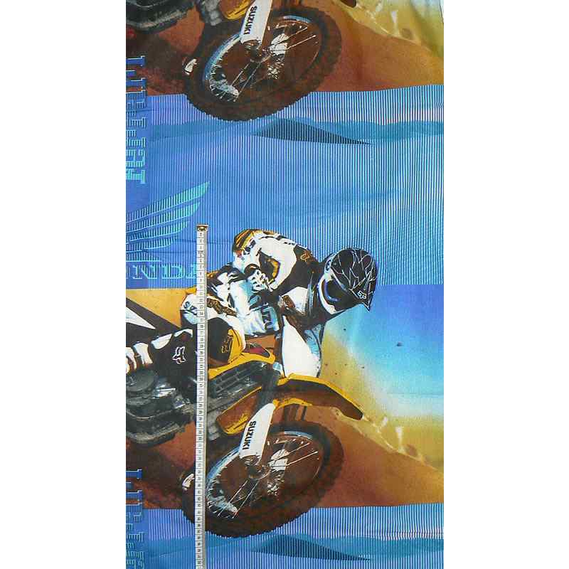5V112 Bavlněná látka 148x83cm motorkáři na modré zbytek na patchwork