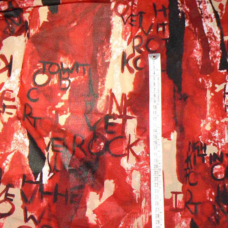 Polyesterová pružná průhledná lehounká látka 66x100cm červená písmena (1P84)