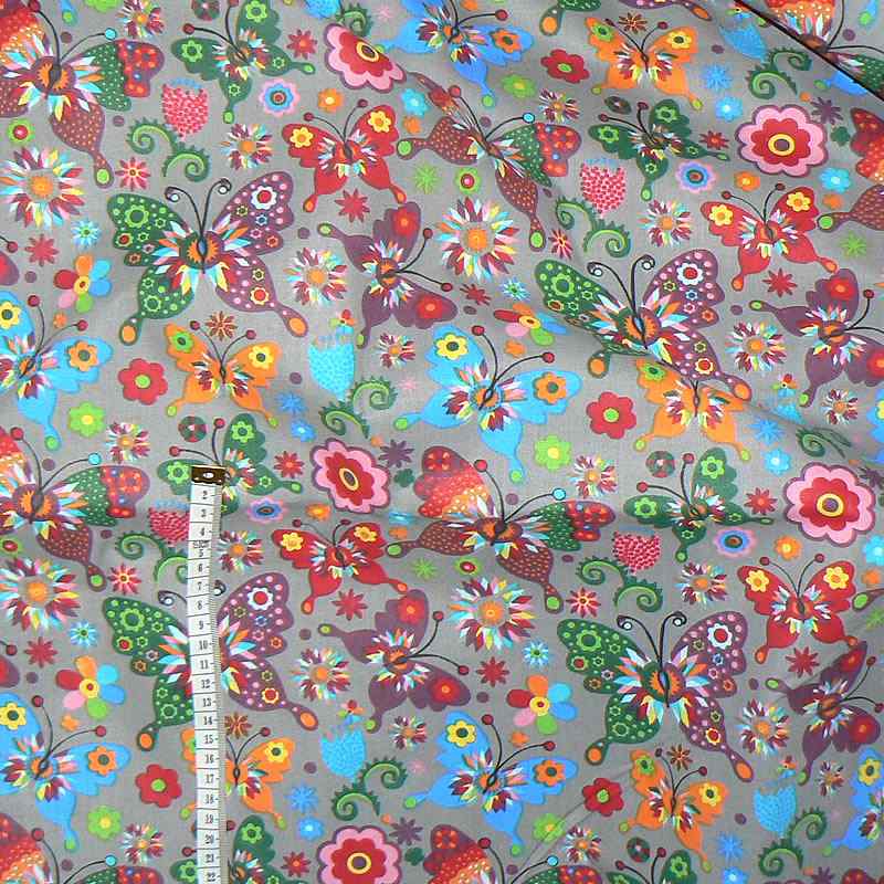 0907 Bavlněná látka plátno 40x79cm barevní motýlci na šedé
