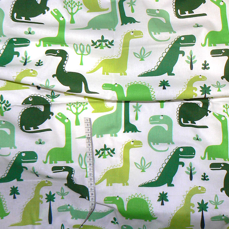 6K90 Bavlněná látka plátno 154x55cm dinosauři zelená zbytek na patchwork