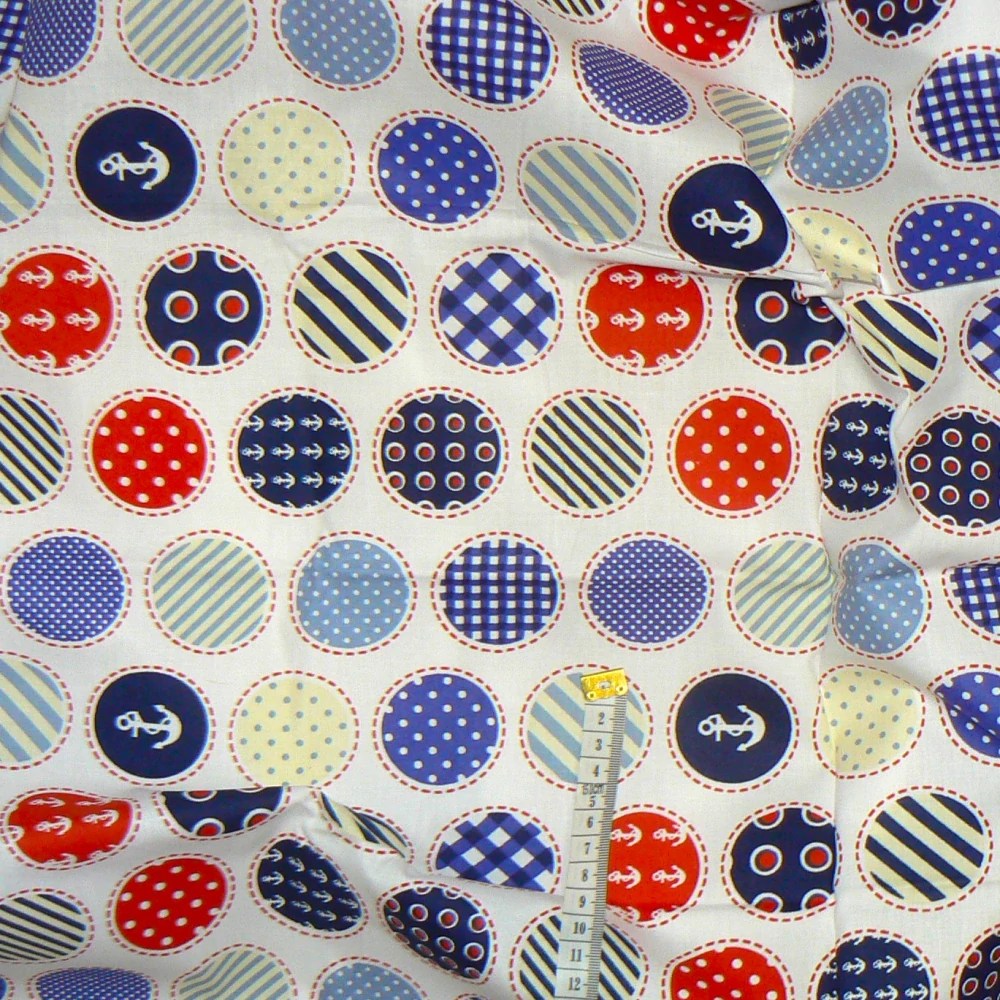 6O187 Bavlněná látka 58x16cm kotvičky v kolečku zbytek na patchwork