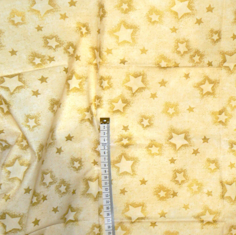 6O254 Bavlněná látka 50x70cm hvězdy na žluté zbytek na patchwork