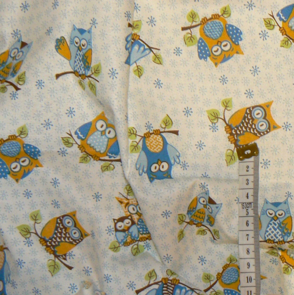 6O282 Bavlněná látka 26x140cm sovičky modrá zbytek na patchwork