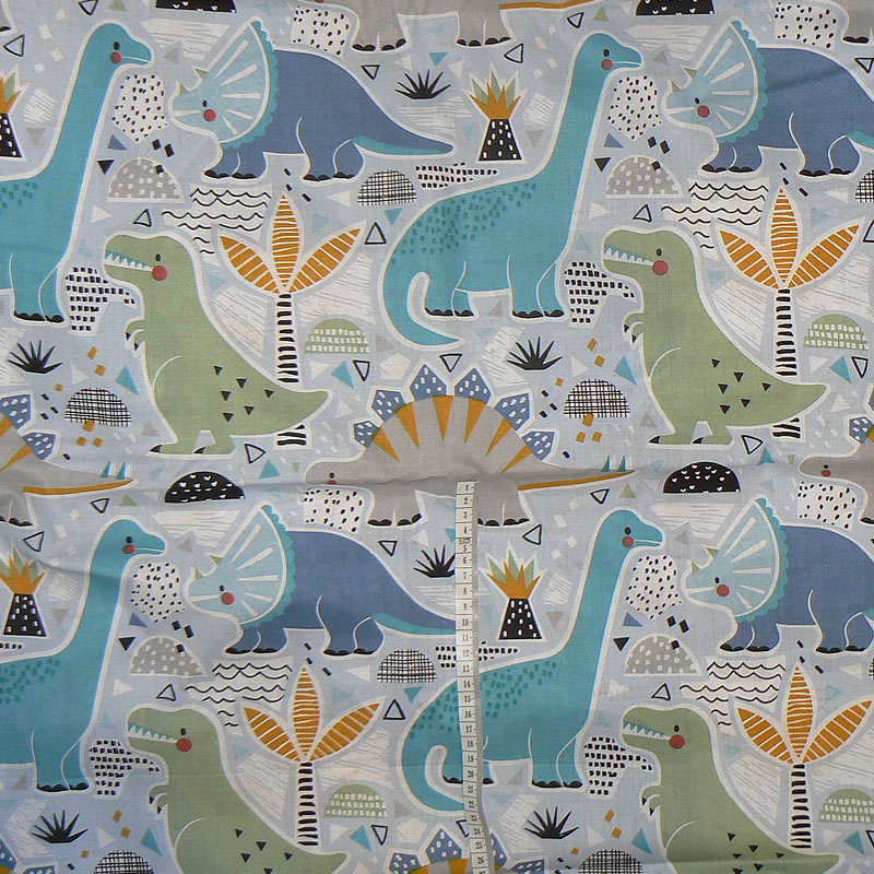 01057 Bavlněná látka 40x79cm velcí dinosauři na modré zbytek na patchwork
