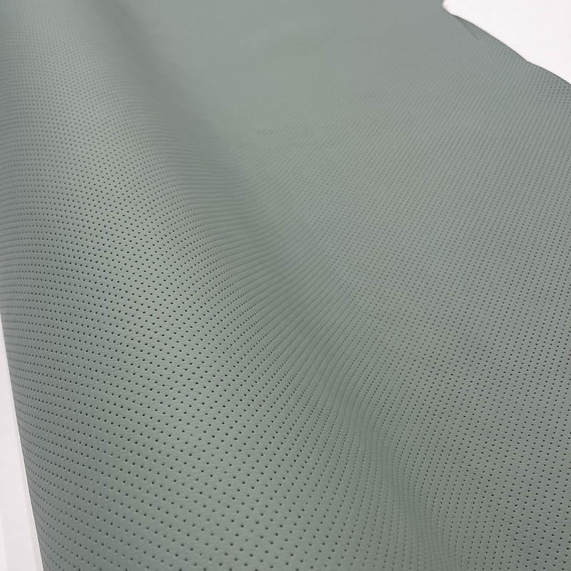 KK403 Exkluzívní koženka zbytek 45x140cm koženka mini puntíček sv. šedozelená na vatelínu