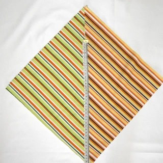 7G77 Bavlněný žerzej látka 19x20cm oranžovožlutá pruhy (vpravo) zbytek na patchwork